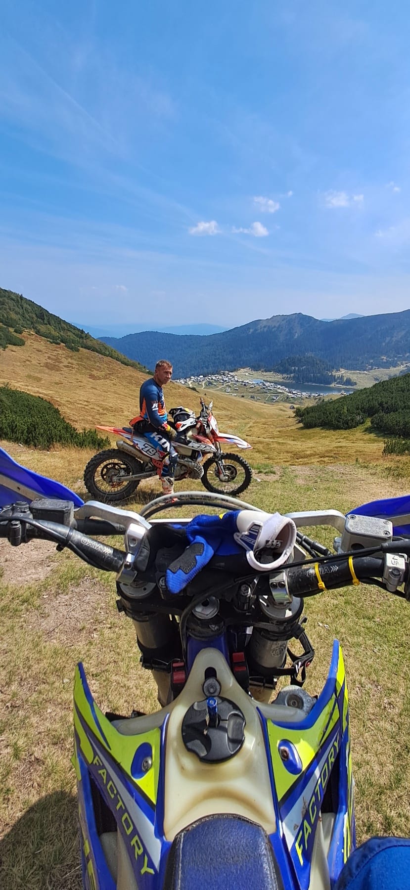 Group of riders at mountain peak